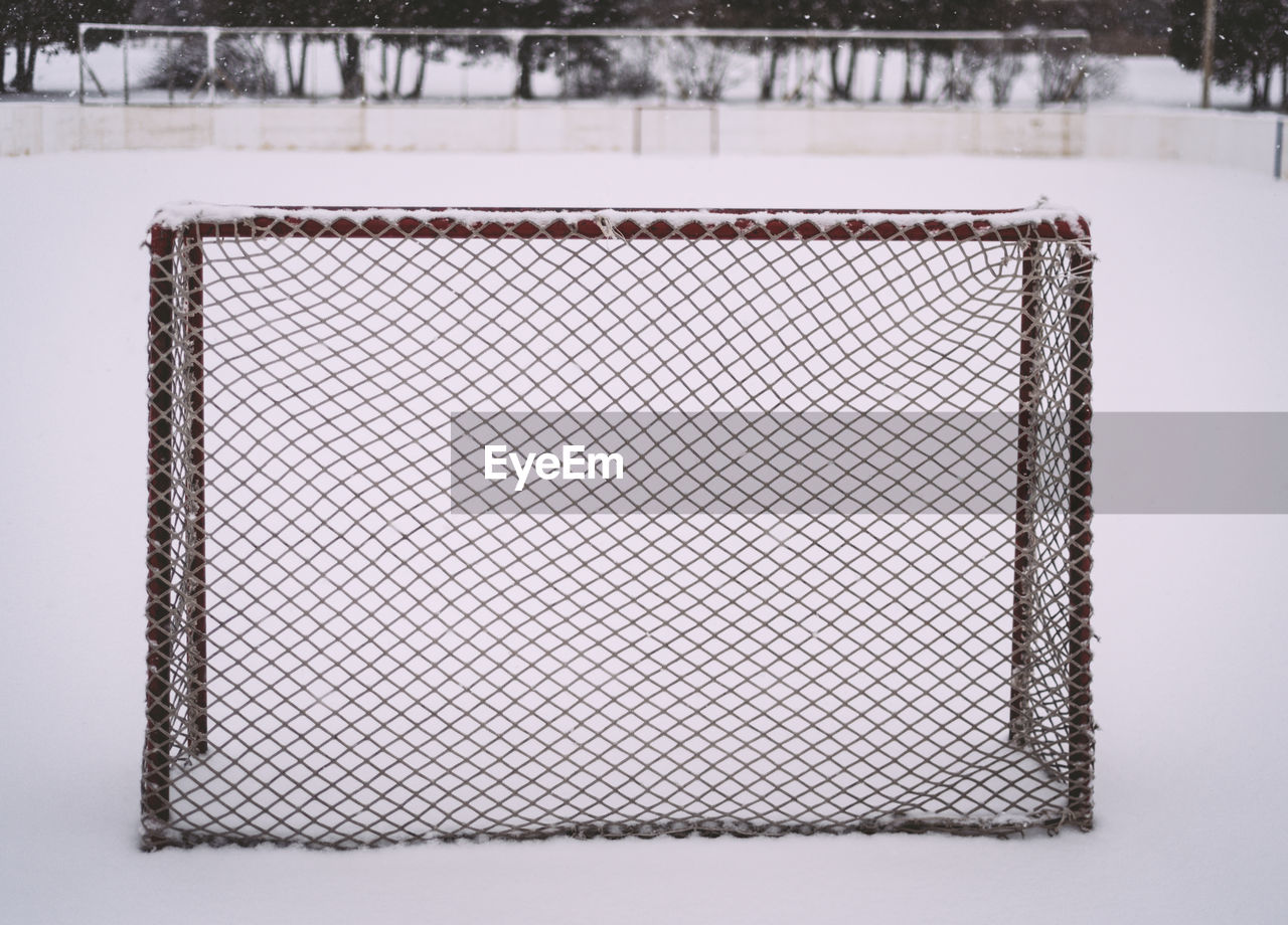 Snow on metallic structure in winter