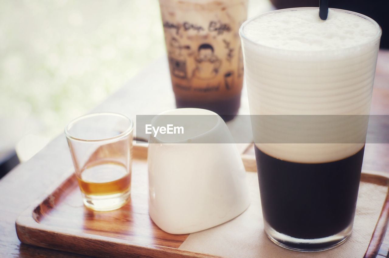 Close-up of coffee served on table