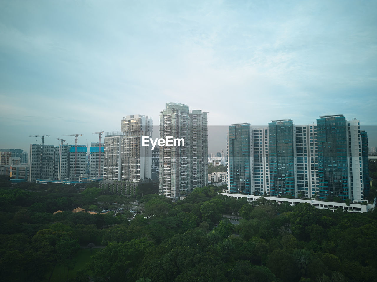 city, architecture, building exterior, built structure, building, horizon, sky, skyscraper, office building exterior, skyline, metropolitan area, landscape, cityscape, urban area, residential district, urban skyline, nature, tower block, cloud, no people, downtown district, metropolis, city life, outdoors, tree, tower, downtown, landmark, office, development, plant, travel destinations, blue, day, travel, construction industry, residential area, environment, business, growth