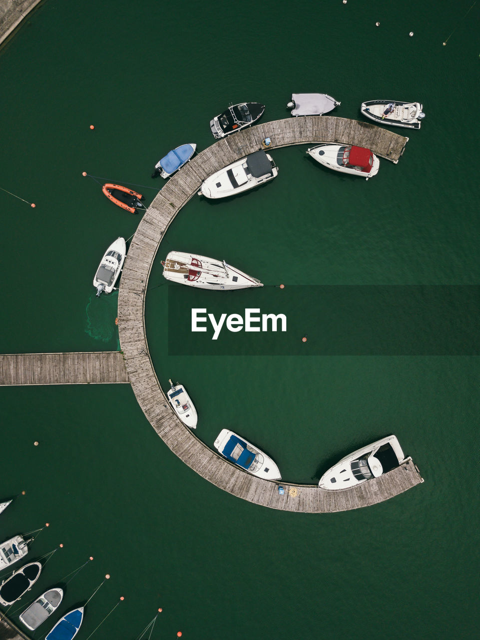 Round wooden pier. water transport.