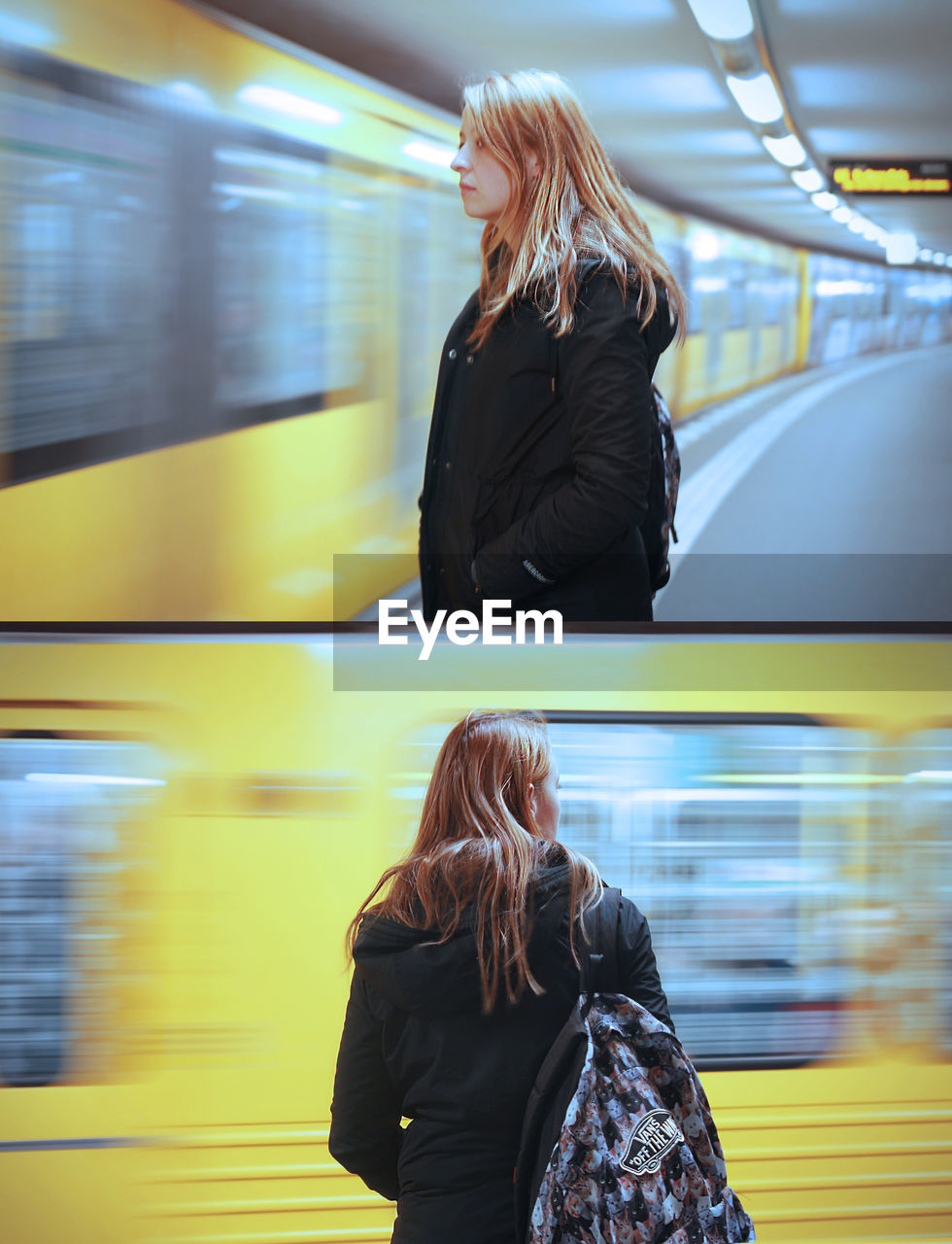 REAR VIEW OF WOMAN STANDING ON TRAIN