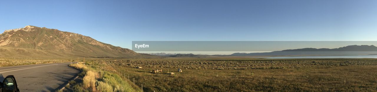 PANORAMIC VIEW OF ROAD AGAINST CLEAR SKY