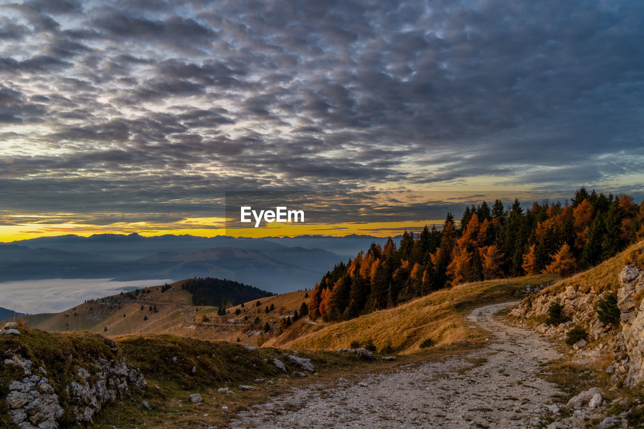 Scenic view of landscape against sky during sunset