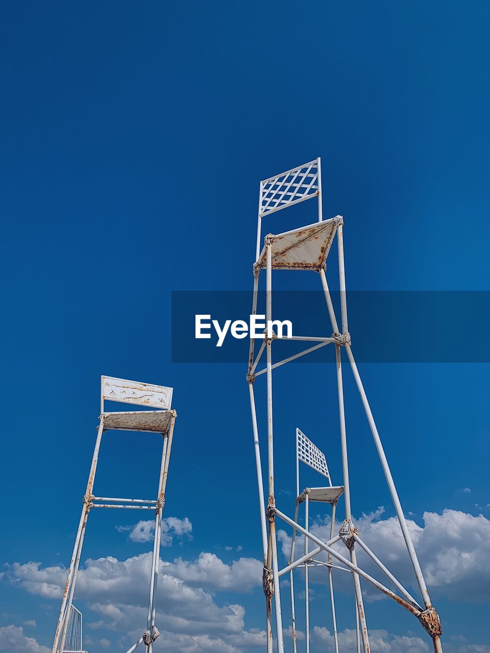 Low angle view of chair against clear sky