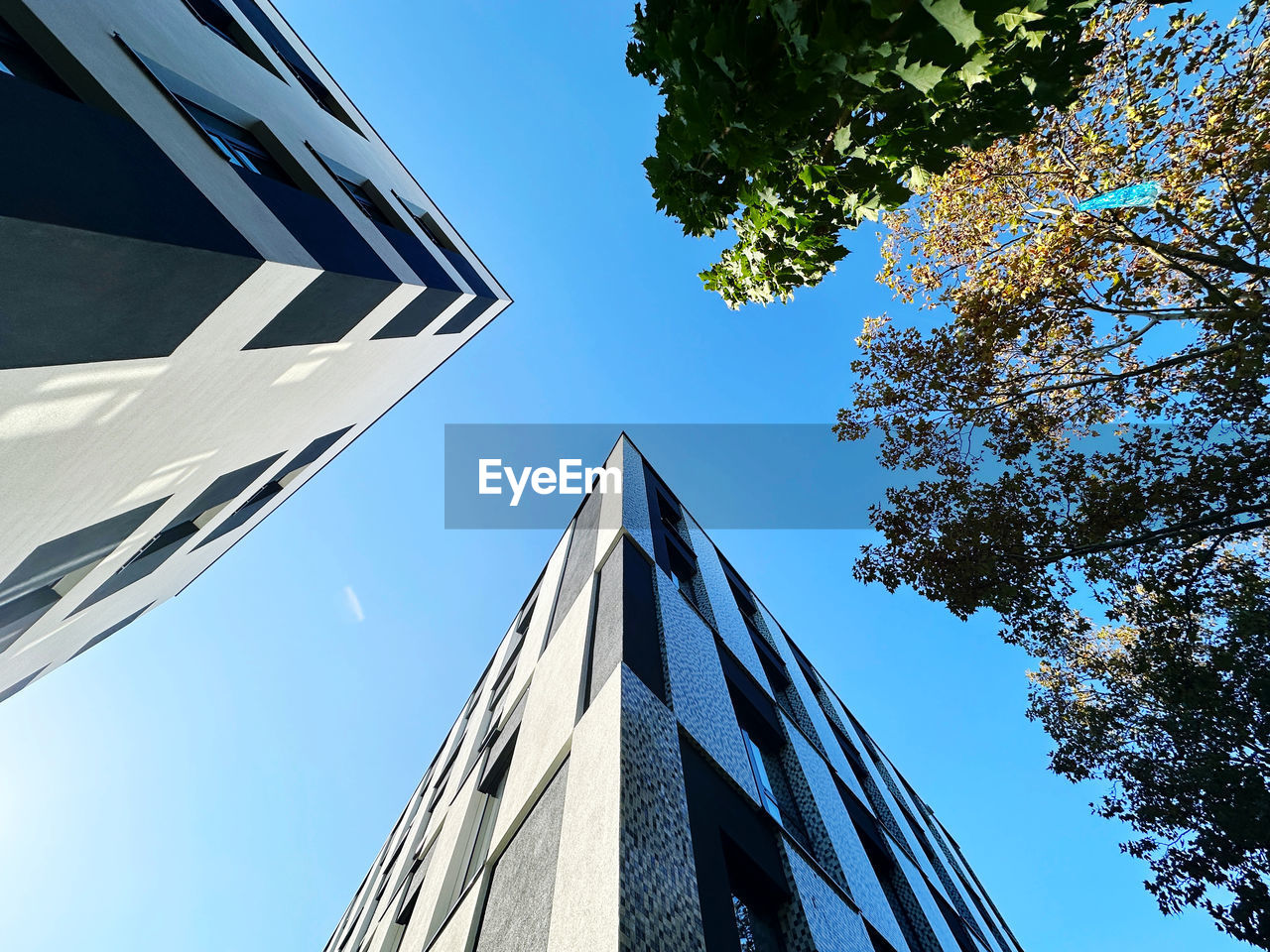 low angle view of skyscraper against clear sky