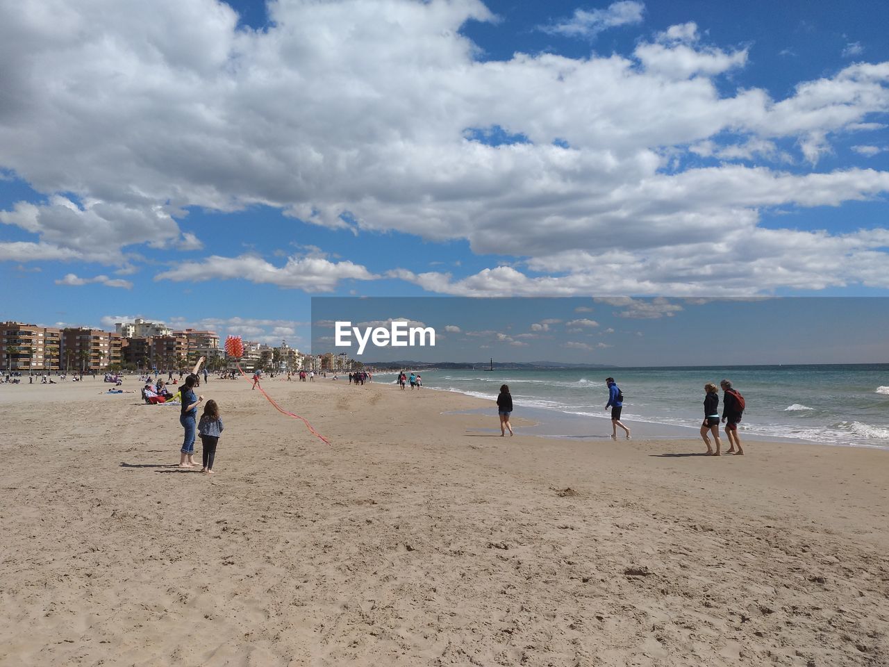 People playing at beach