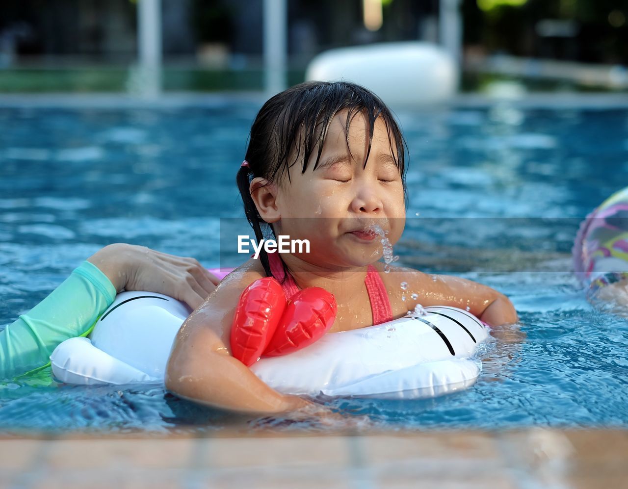 Girl swimming in pool