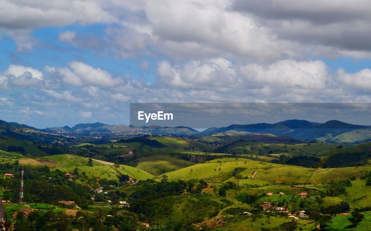 SCENIC VIEW OF FARM AGAINST SKY