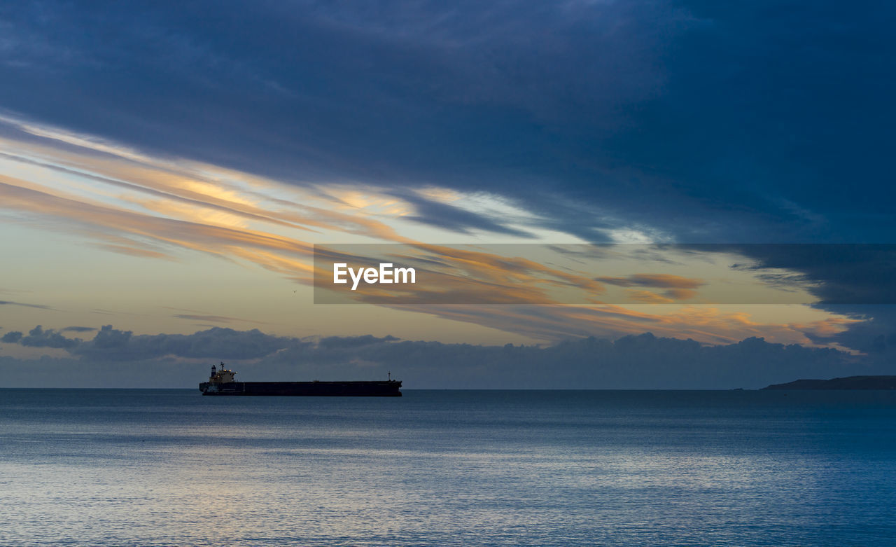 Oil tanker at anchor off falmouth, cornwall, uk
