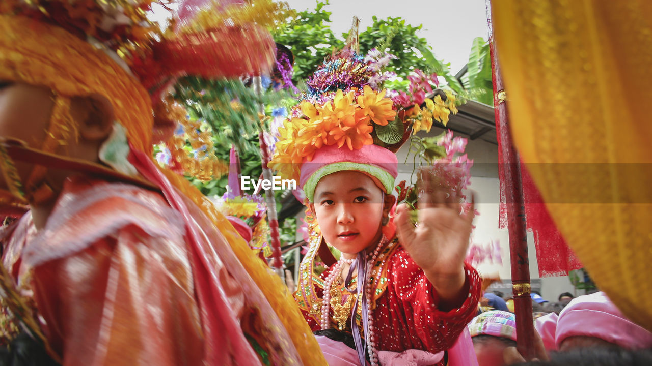 Portrait of boy in traditional costume during festival