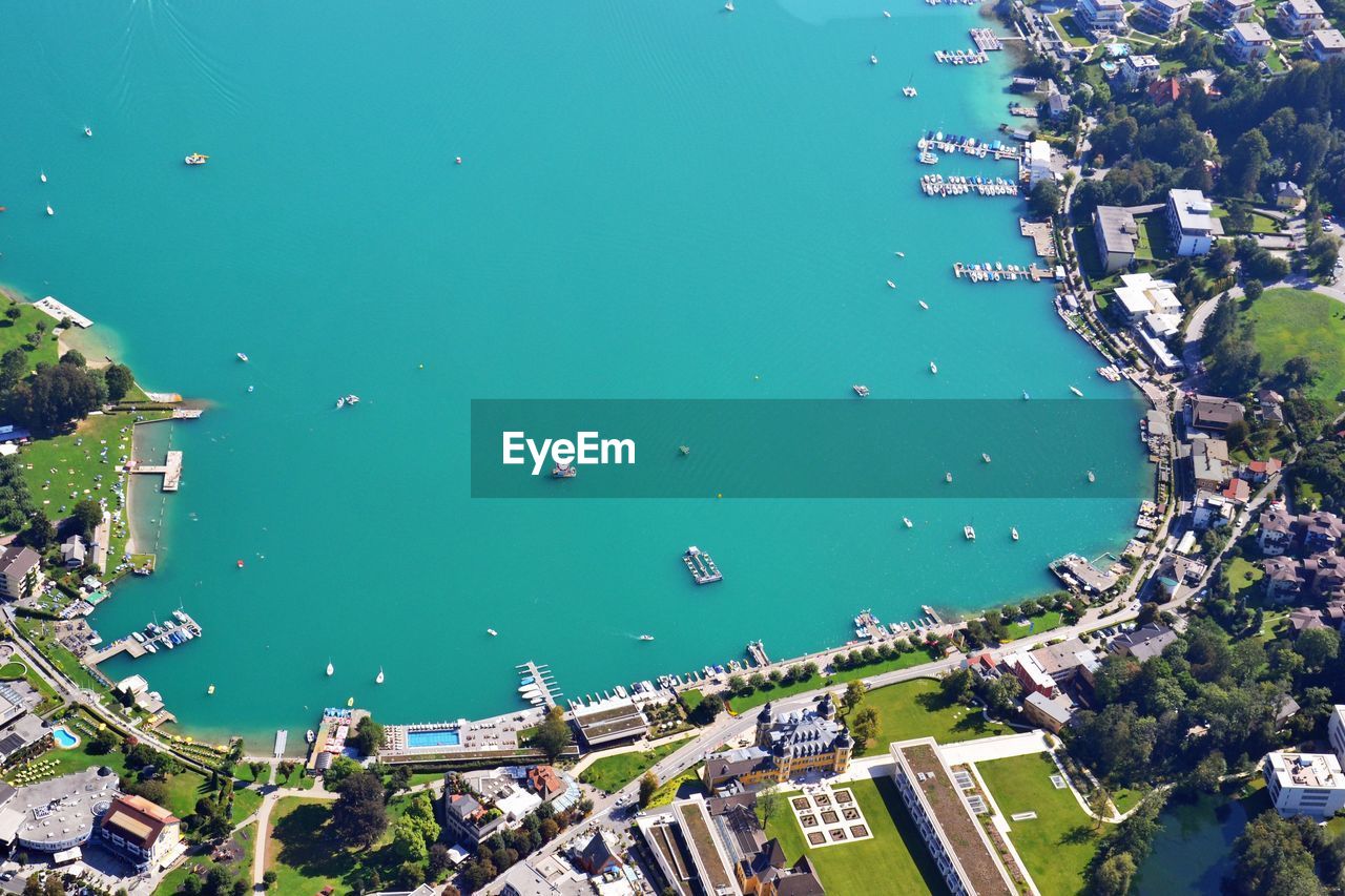 High angle view of buildings and sea in city