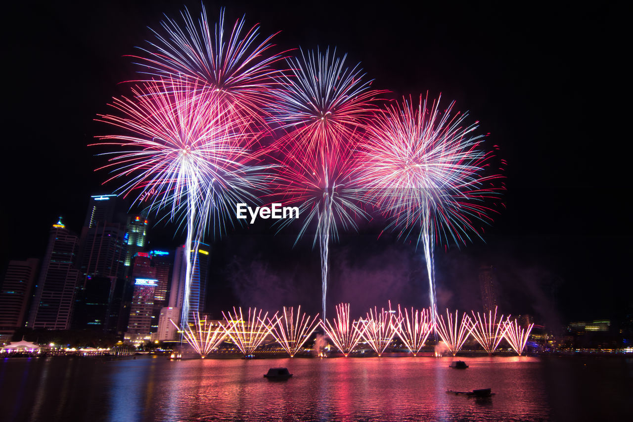 Low angle view of sky illumed with fire crackers