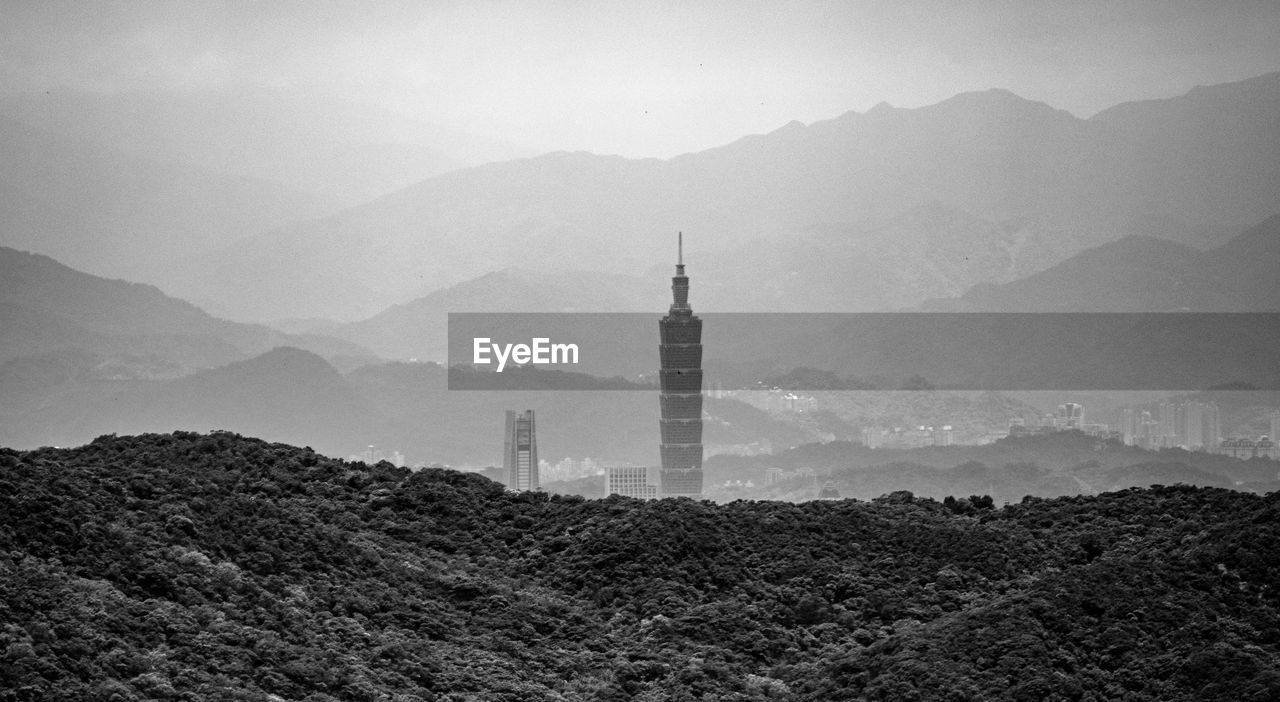 Taipei 101 tower among the mountain lines.