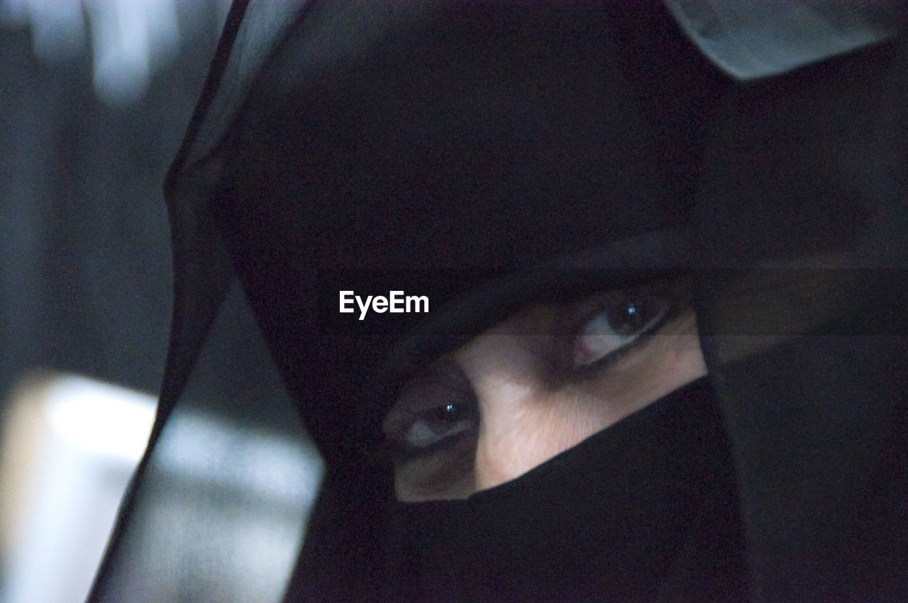 Close-up portrait of woman wearing burka