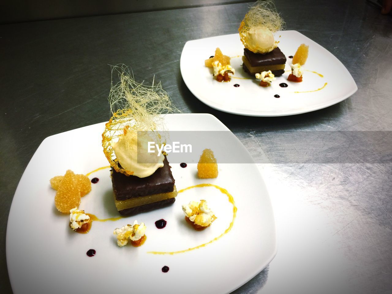 HIGH ANGLE VIEW OF FOOD SERVED IN PLATE