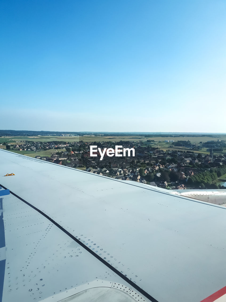 AERIAL VIEW OF CITY AGAINST SKY