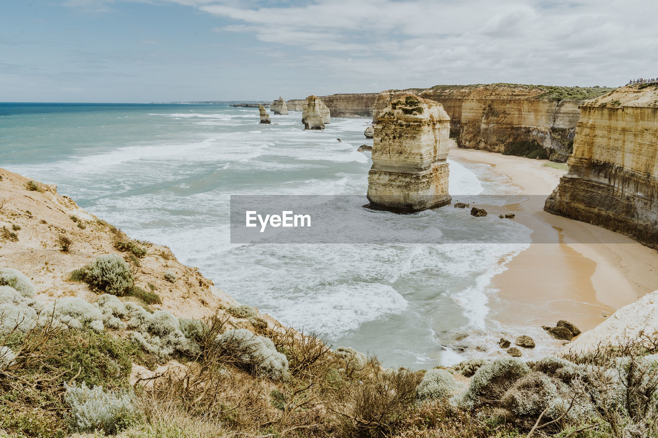 PANORAMIC VIEW OF BEACH AGAINST SKY