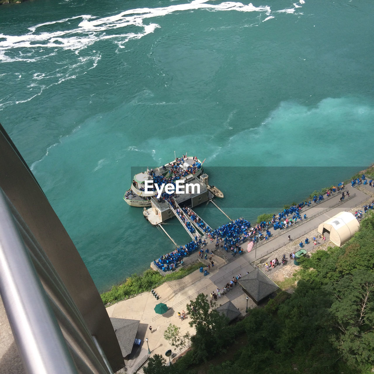 High angle view of crowd by ferry moored in niagara river