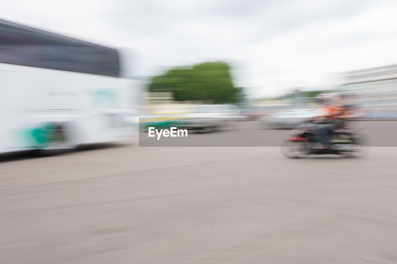 BLURRED MOTION OF VEHICLES ON ROAD