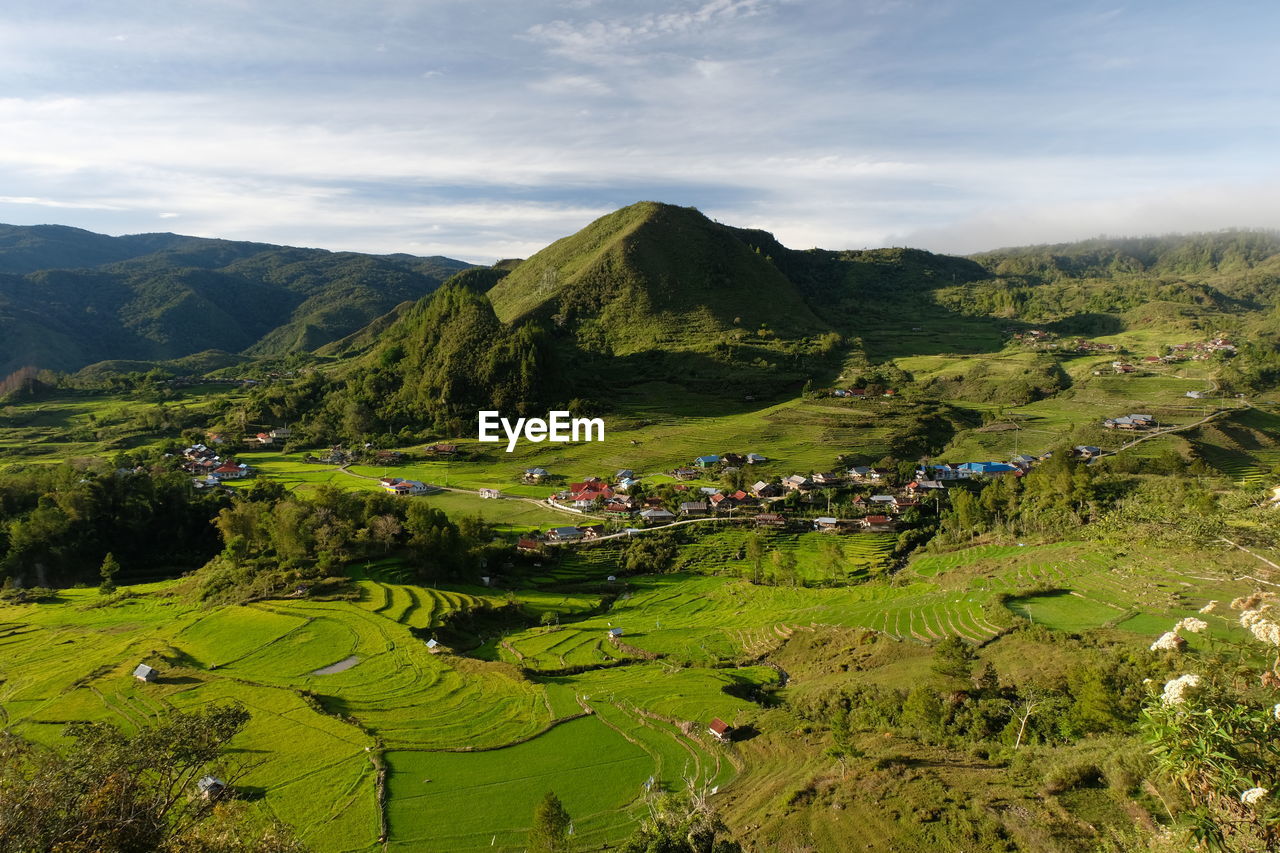 Scenic view of terrace field with village in the middle