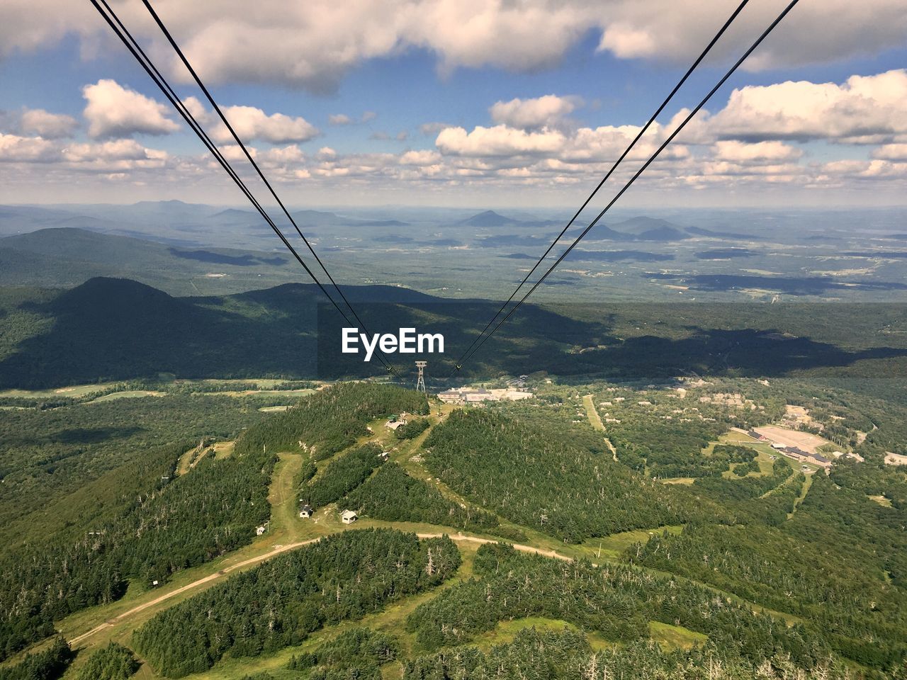 Landscape with mountain range in background