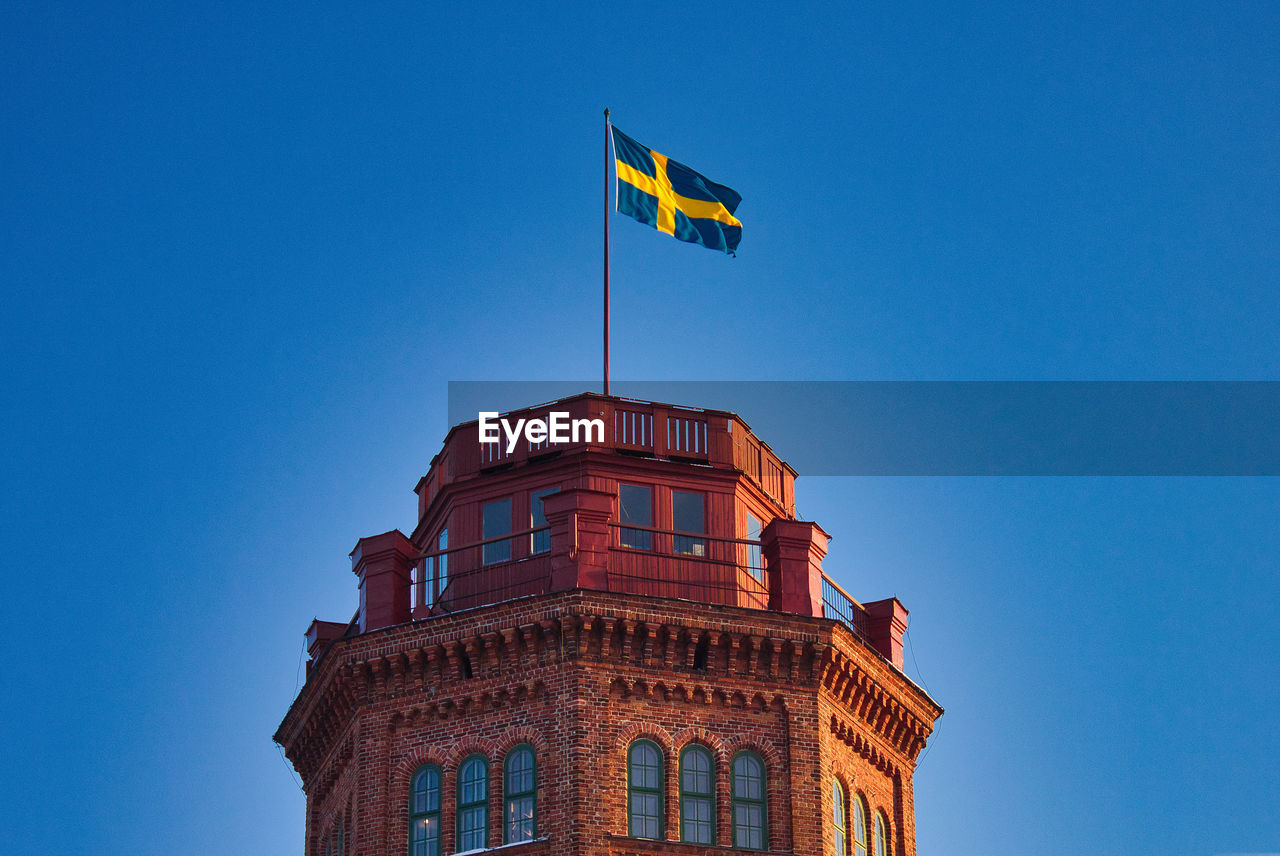 Low angle view of building against clear blue sky in sweden