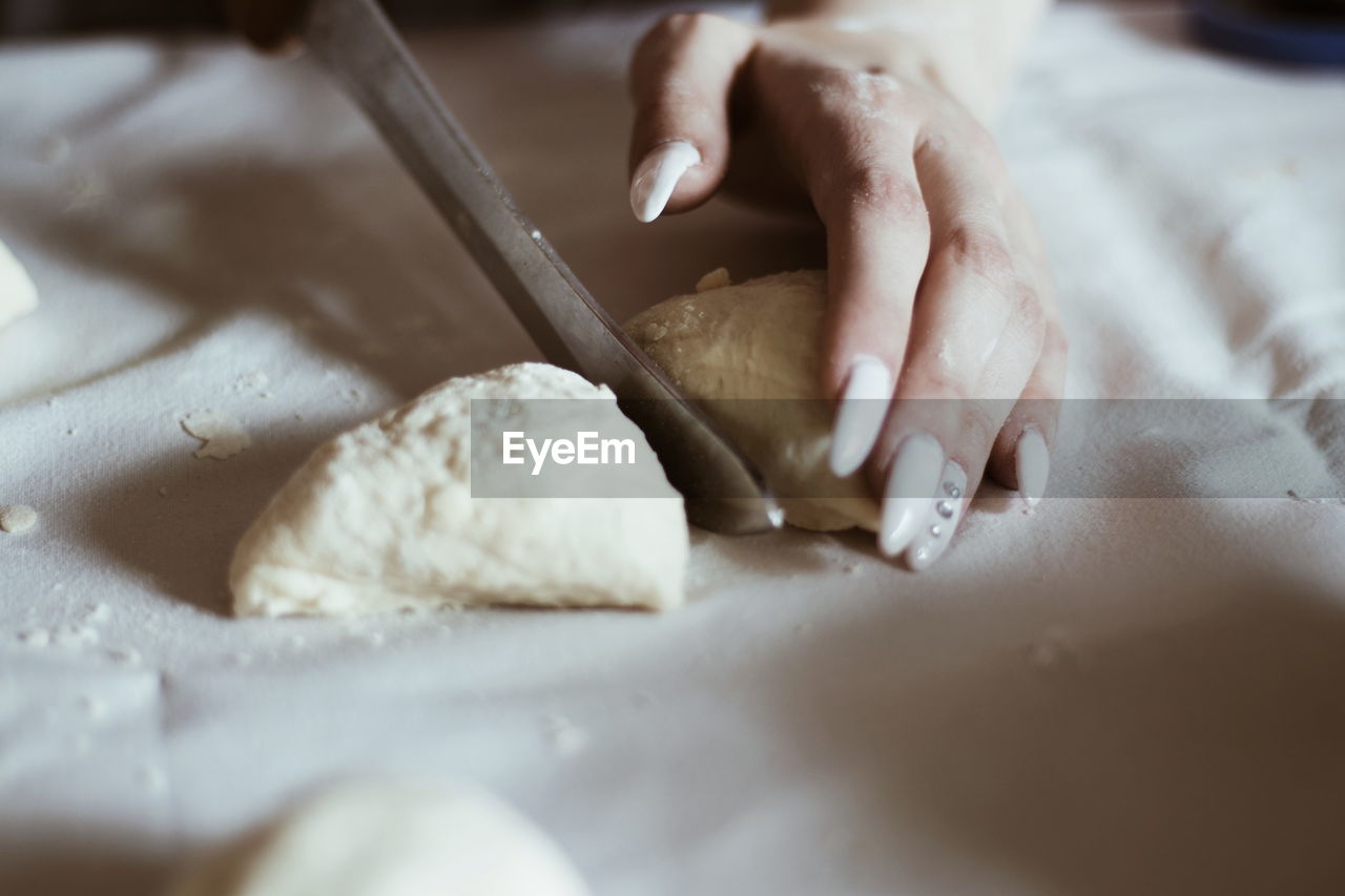 Close-up of woman preparing food