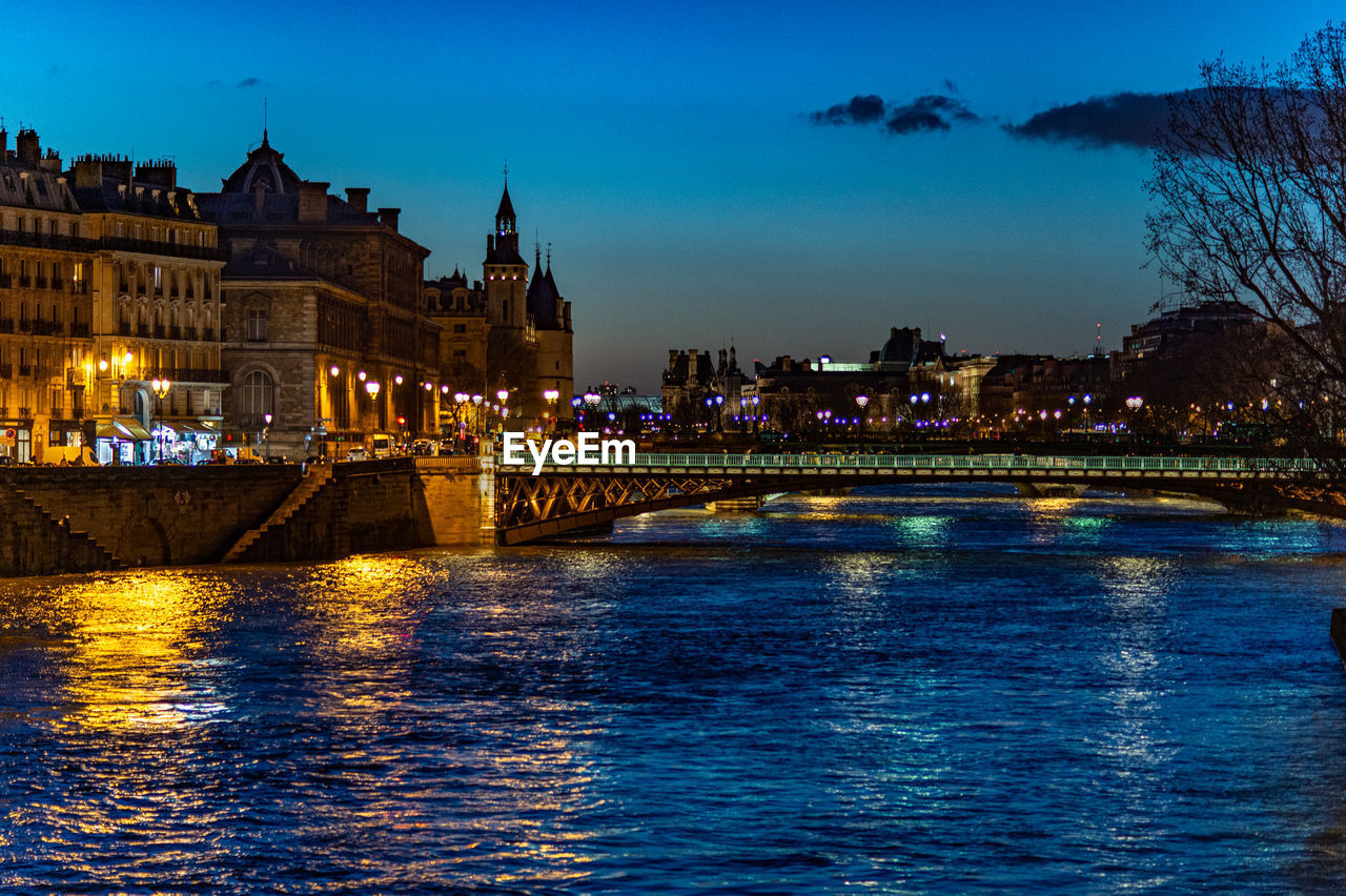 Illuminated buildings at waterfront