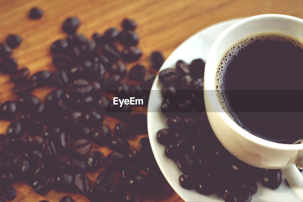 Close-up of coffee cup on table