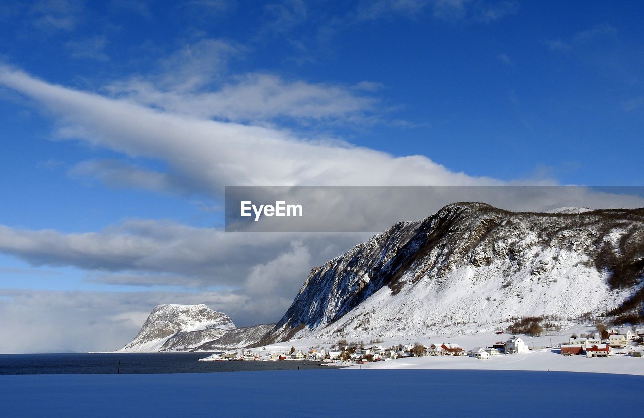 SCENIC VIEW OF SNOWCAPPED MOUNTAIN AGAINST SKY