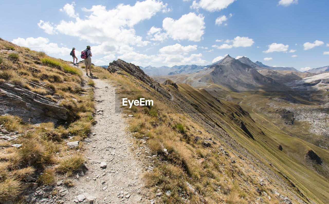 Hiking on the peaks of the vanoise massif in the alps in summer