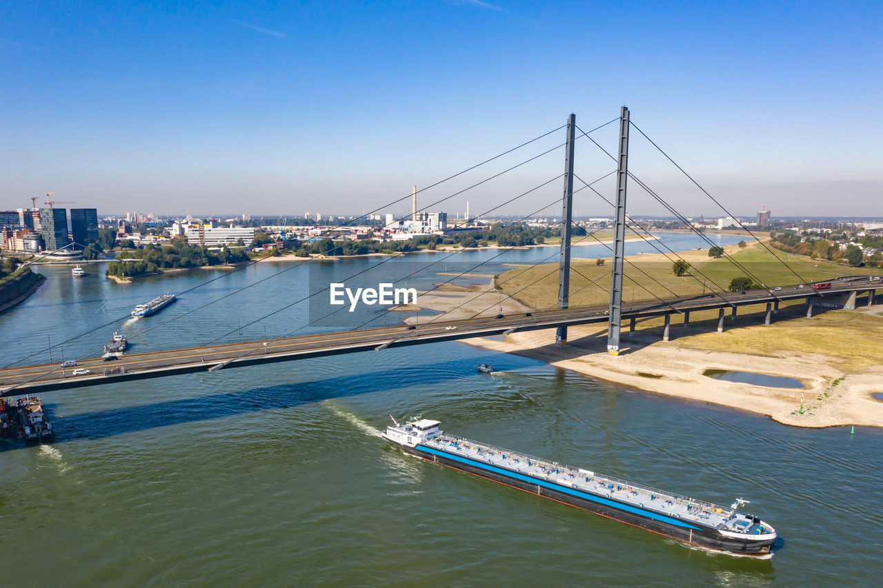 Bridge over the river rhine rheinkniebrücke in düsseldorf from a bird's eye view, drone photography