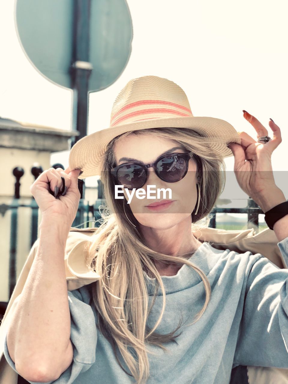 Portrait of young woman wearing sunglasses