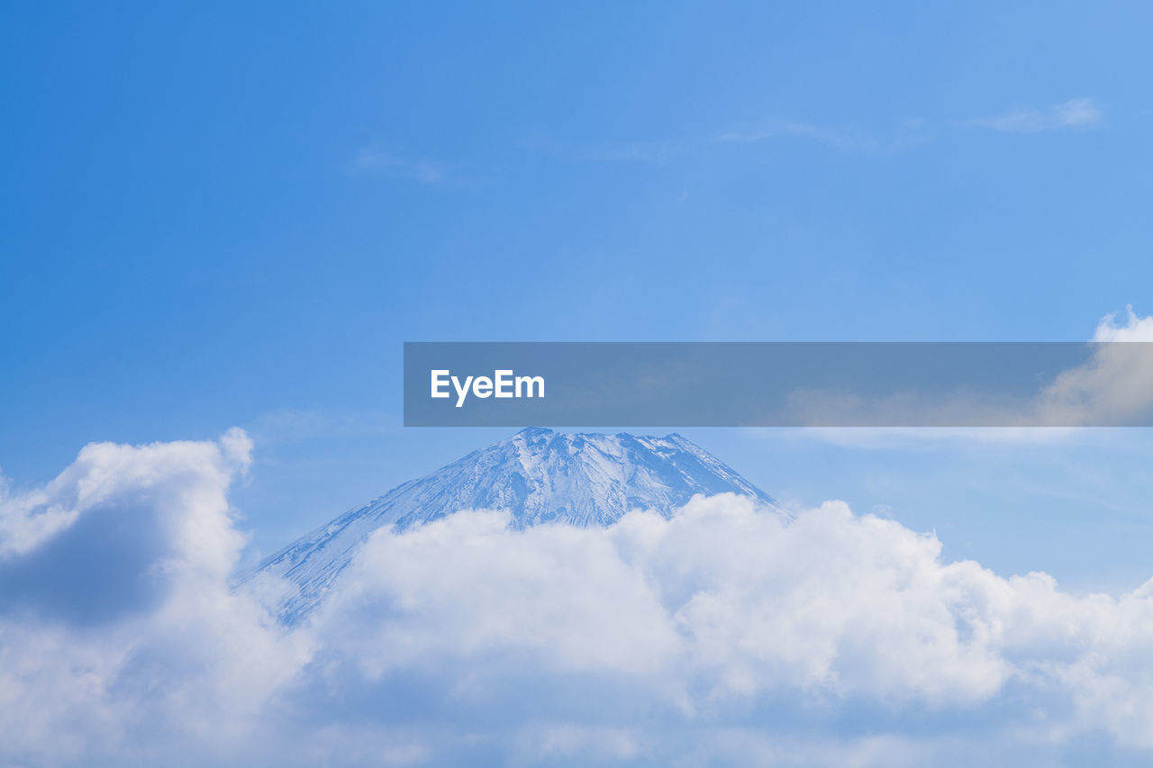 View of clouds over mount fuji and blue sky, yamanashi prefecture, japan