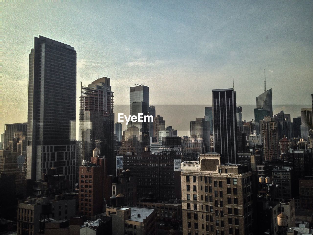 View of skyscrapers in city against sky