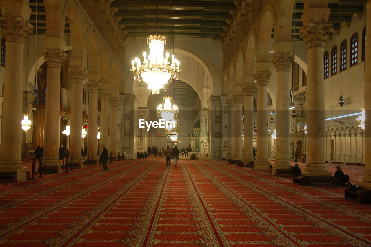 INTERIOR OF ILLUMINATED RAILROAD STATION