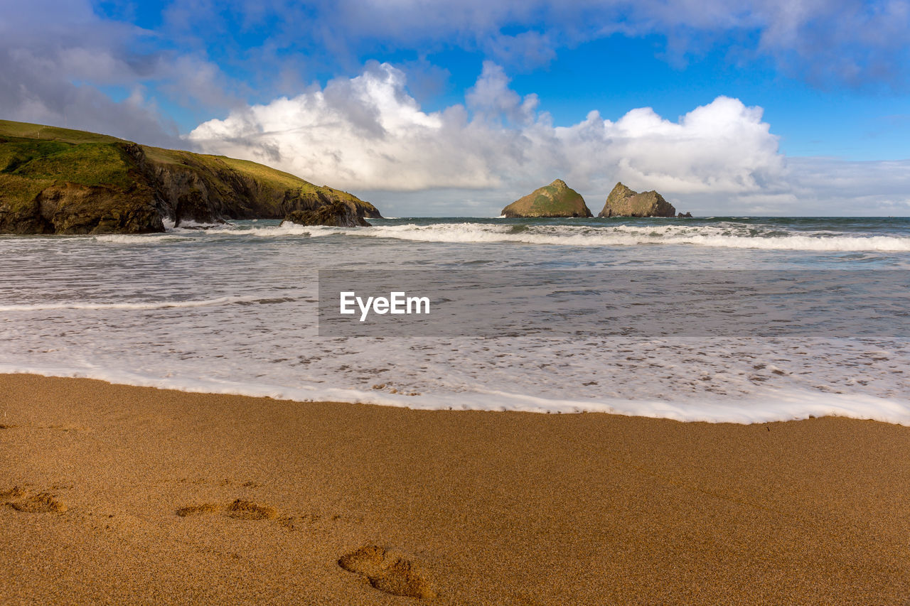 Scenic view of beach against sky