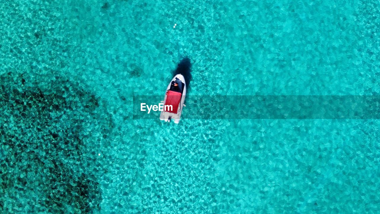 green, high angle view, water, day, blue, nature, azure, outdoors, waterfront, turquoise, turquoise colored, swimming pool, no people, teal, leisure activity, land