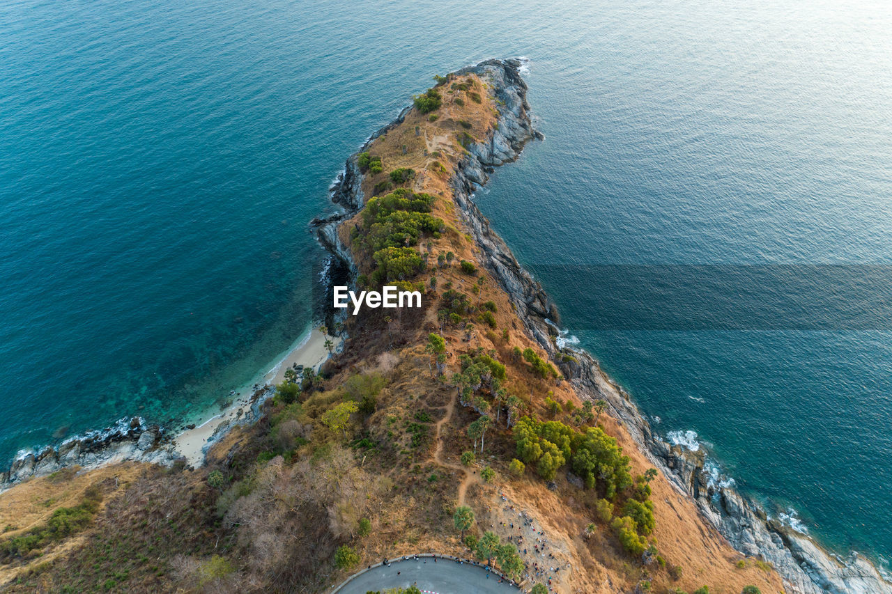 Aerial view of cliff by sea
