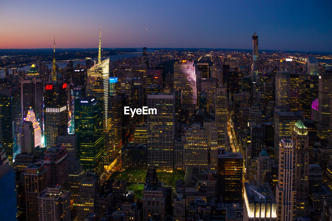 Illuminated cityscape at night
