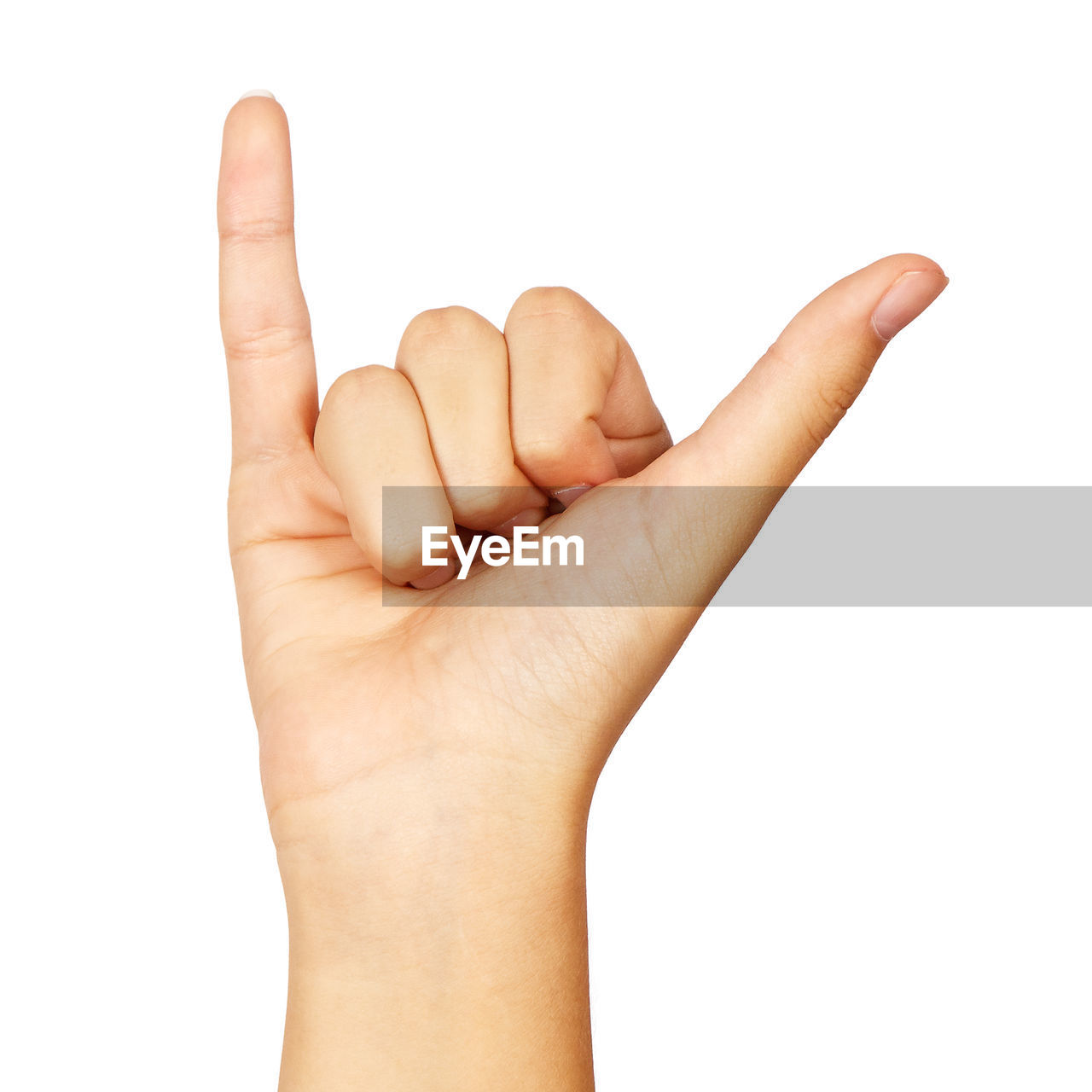 CLOSE-UP OF PERSON HAND AGAINST COLORED BACKGROUND