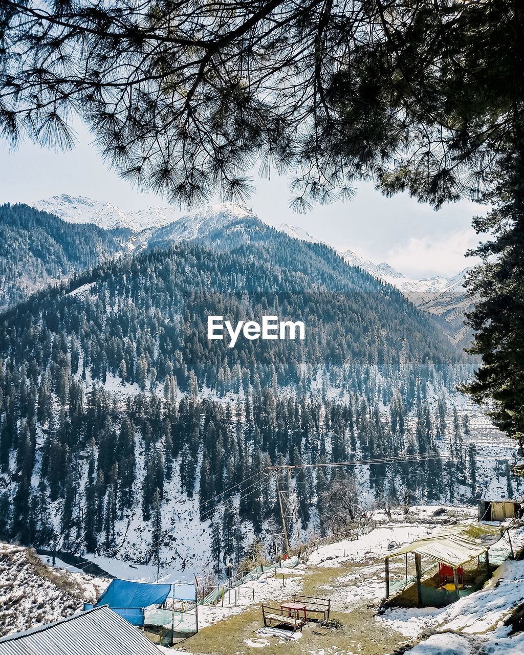 SCENIC VIEW OF MOUNTAINS DURING WINTER