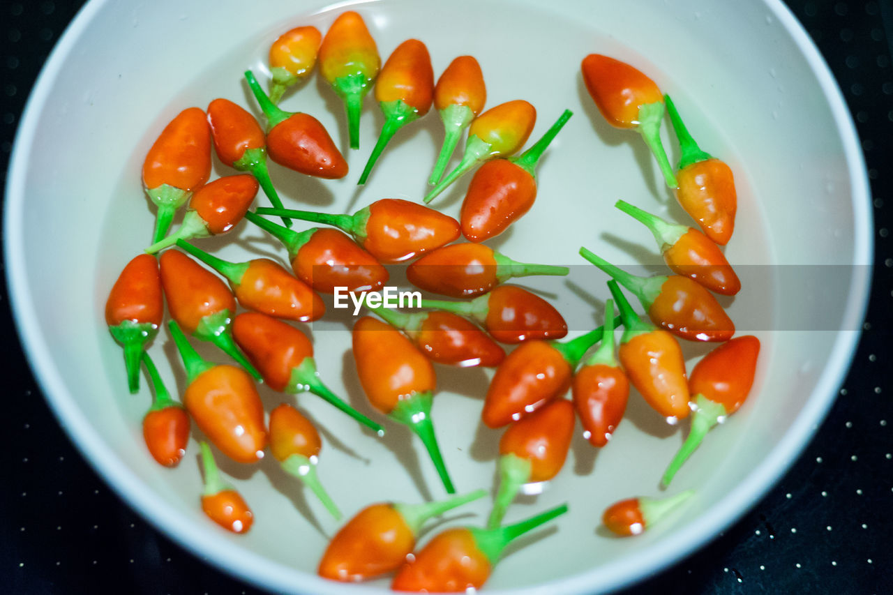 High angle view of red chilies in bowl