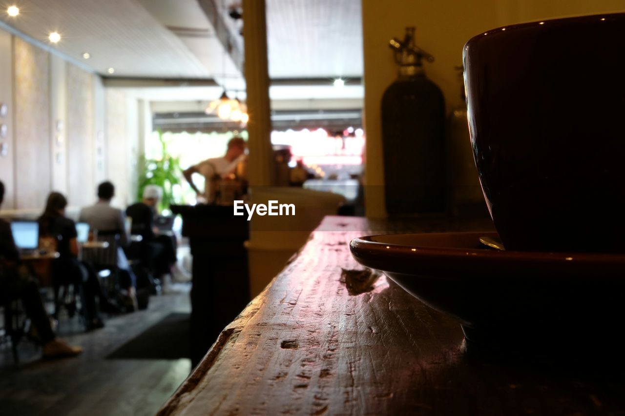 Close-up of cup on table at restaurant