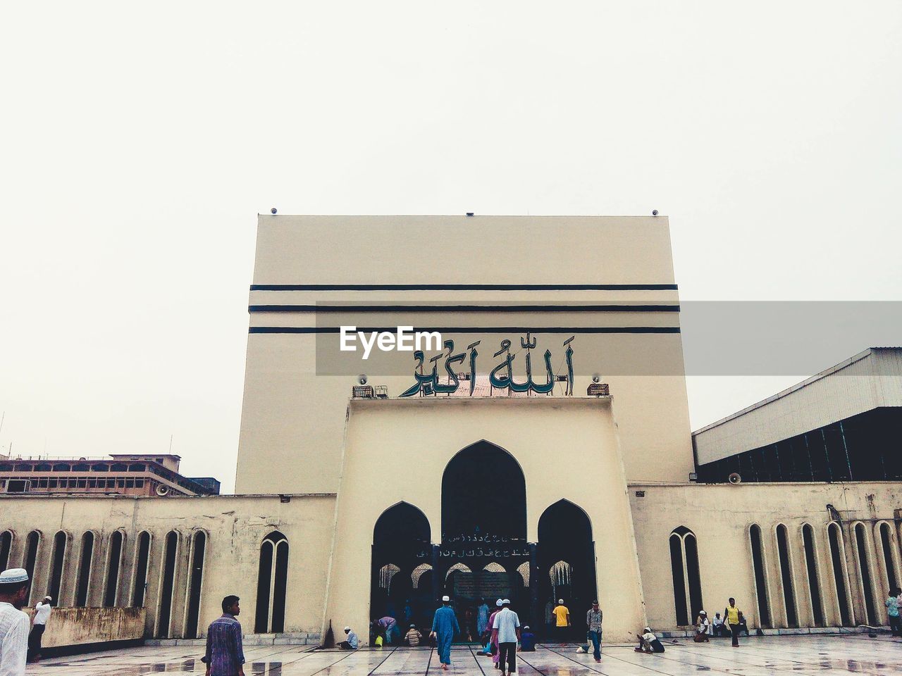 Low angle view of baitul mukarram against sky