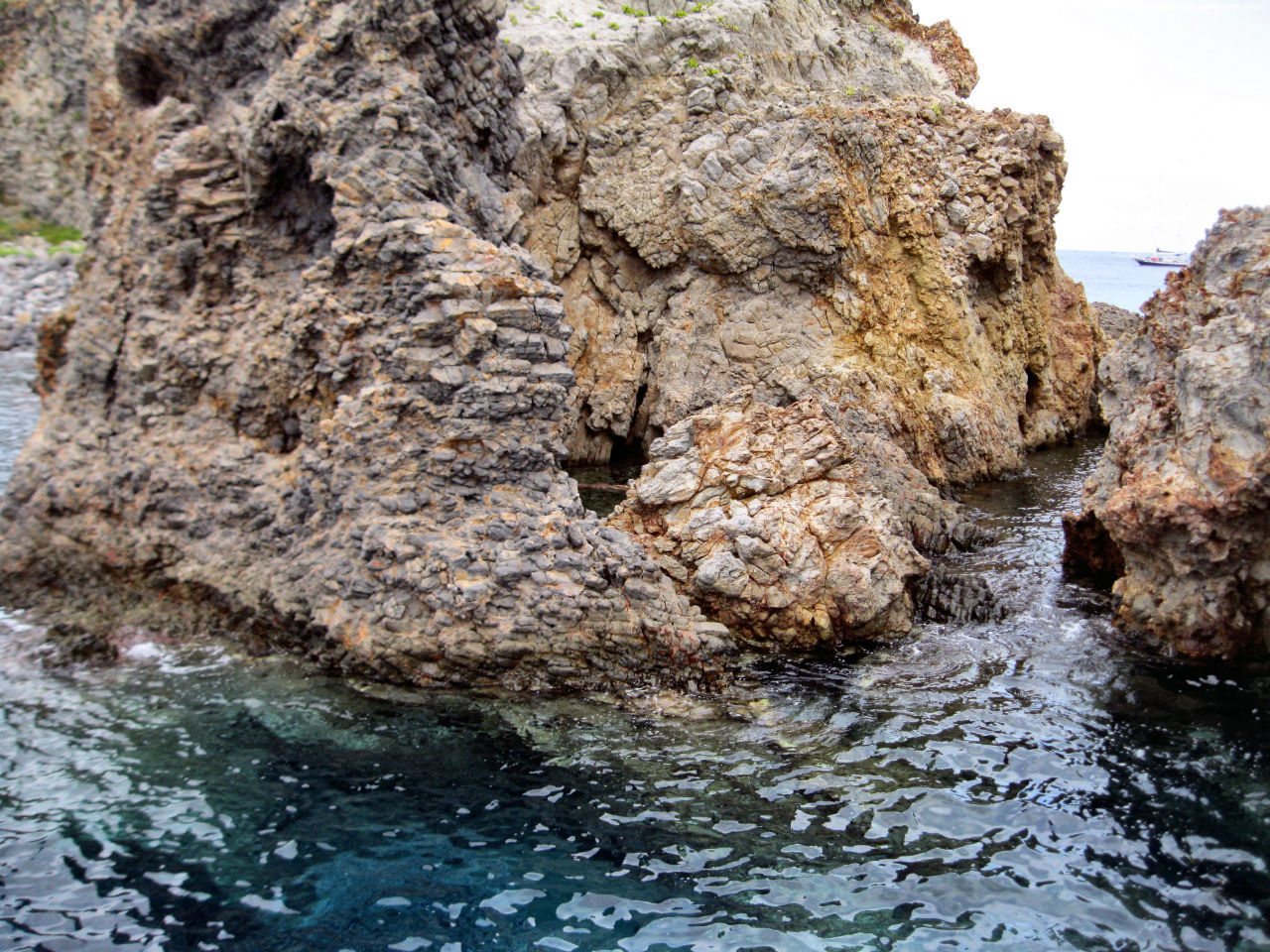 SCENIC VIEW OF ROCKY COASTLINE