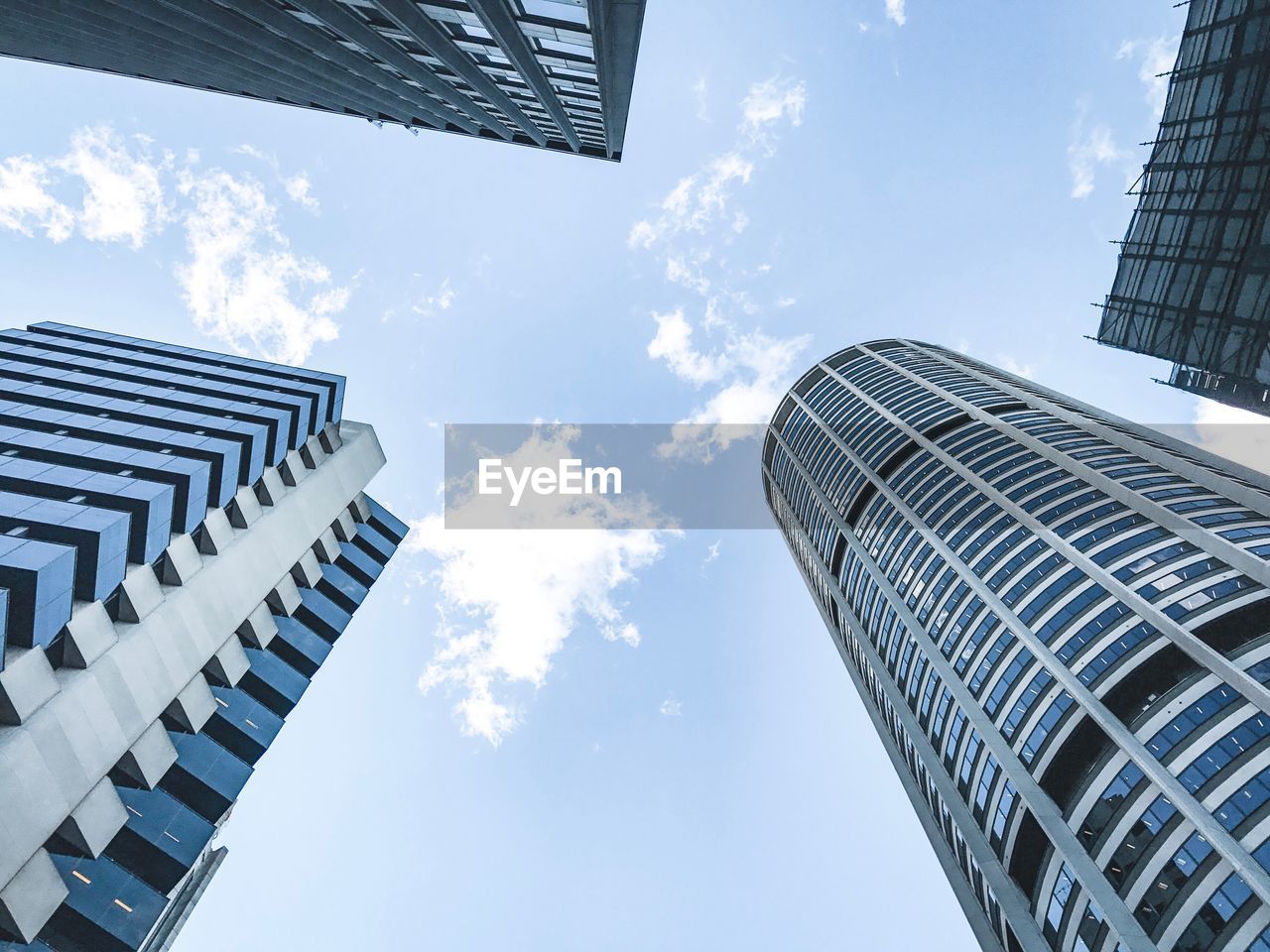 Low angle view of skyscrapers against sky