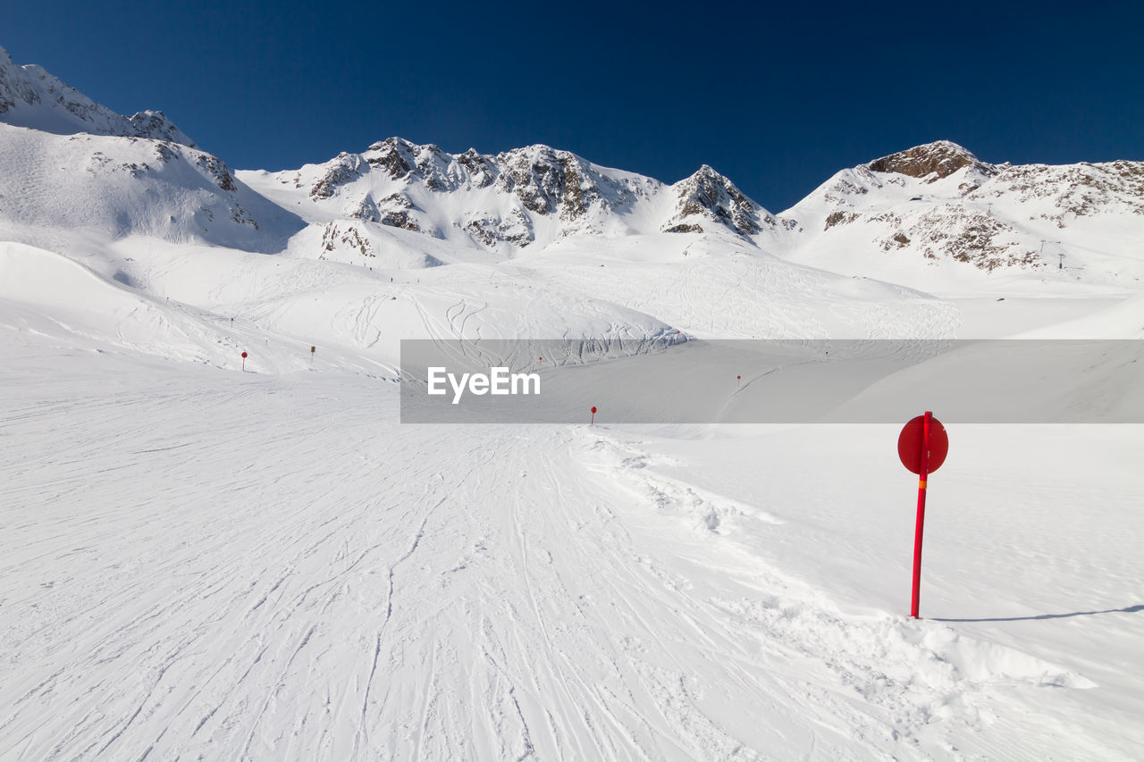 Scenic view of winter landscape and ski slope in austria