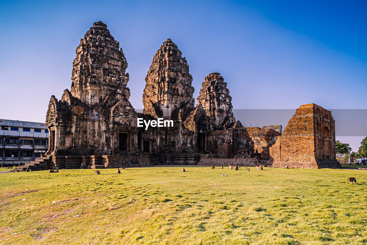 Ancient temple against sky lop buri  temple in thailand .  phraprang sam yot  architecture