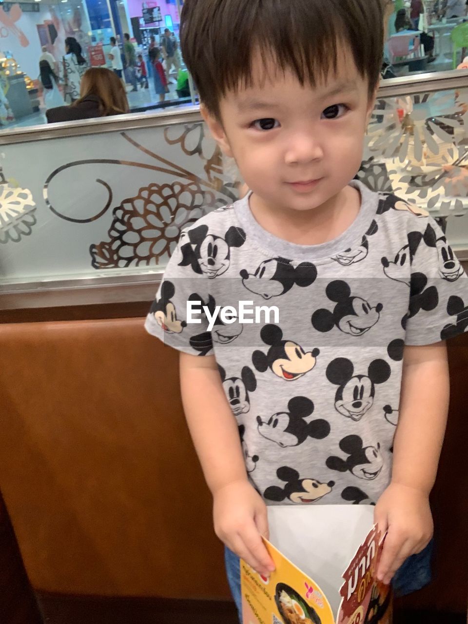 PORTRAIT OF CUTE BABY BOY AT HOME